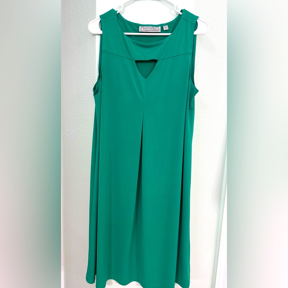 Simonton Says Green Dress with cut out detail.